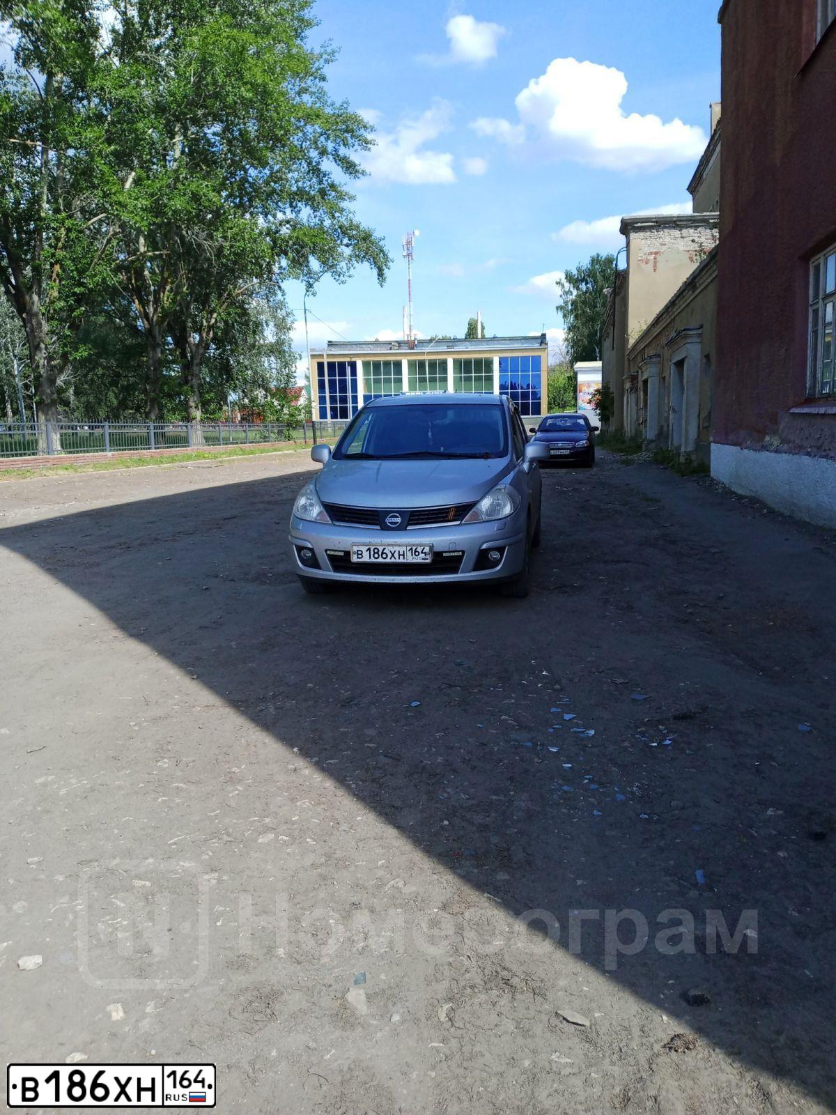 Фото автомобиля NISSAN TIIDA, 2007 — госномер Р106ОА68. Цвет: Серебристый