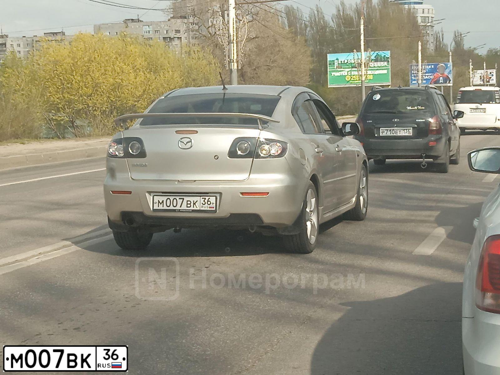 Фото автомобиля MAZDA 3, 2007 — госномер Р666УХ36. Цвет: СЕРО-ЗОЛОТИСТЫЙ