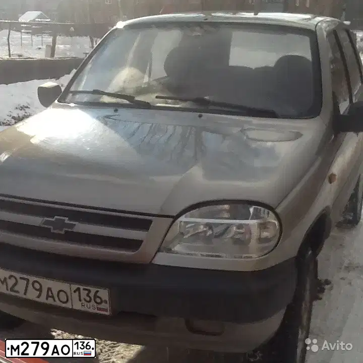 Фото автомобиля CHEVROLET NIVA, 2008 — госномер М635ЕН10. Цвет: СЕРО-КОРИЧНЕВЫЙ МЕТАЛЛИК