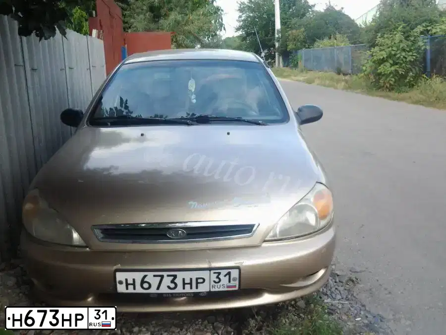 Фото автомобиля KIA RIO, 2002 — госномер С974ВЕ40. Цвет: ЖЕЛТЫЙ