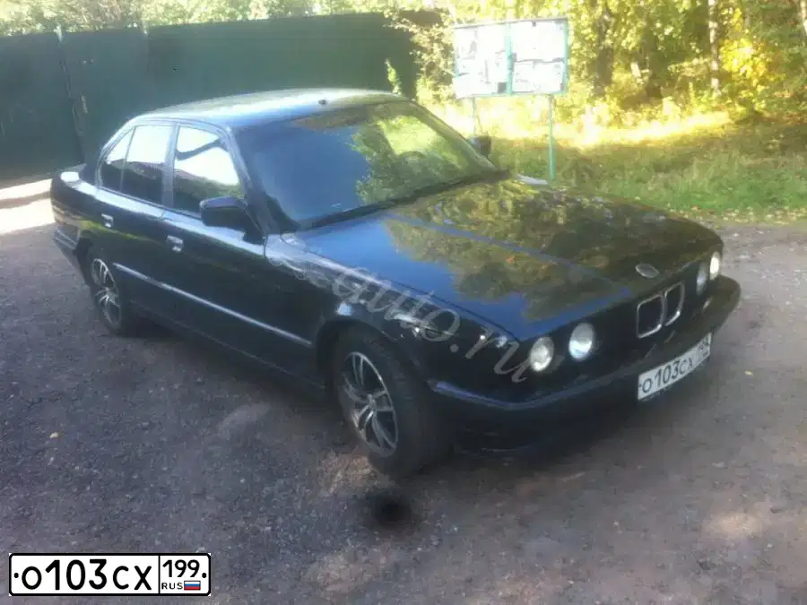 Фото автомобиля BMW SERIE 5, 1990 — госномер О103СХ199. Цвет: ЧЕРНЫЙ
