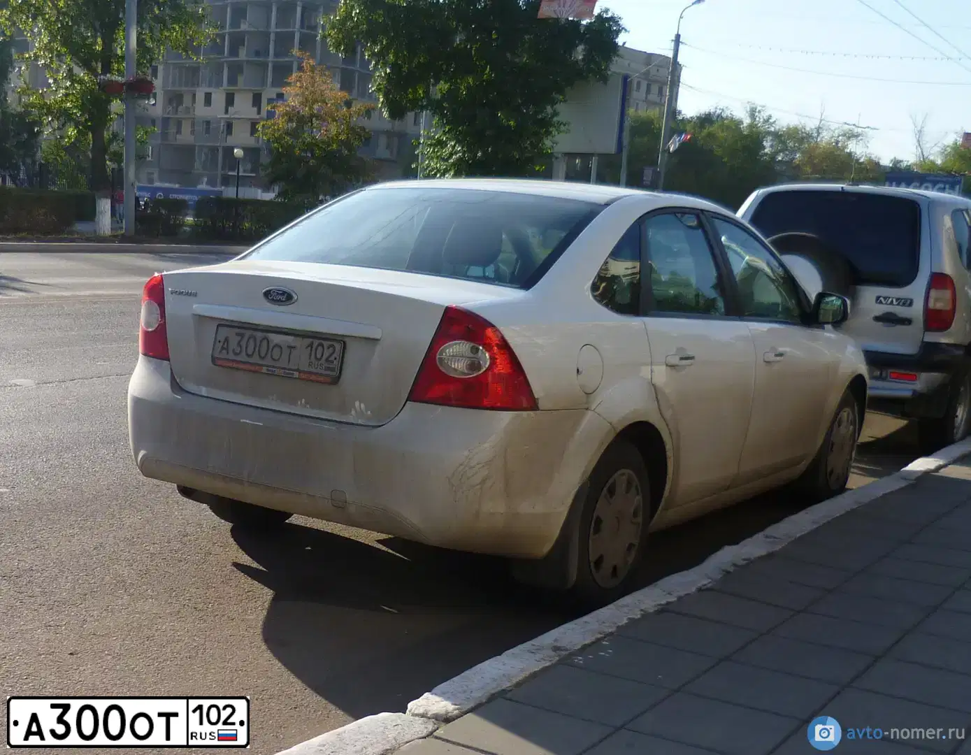 Фото автомобиля FORD FOCUS, 2011 — госномер А300ОТ102. Цвет: Белый