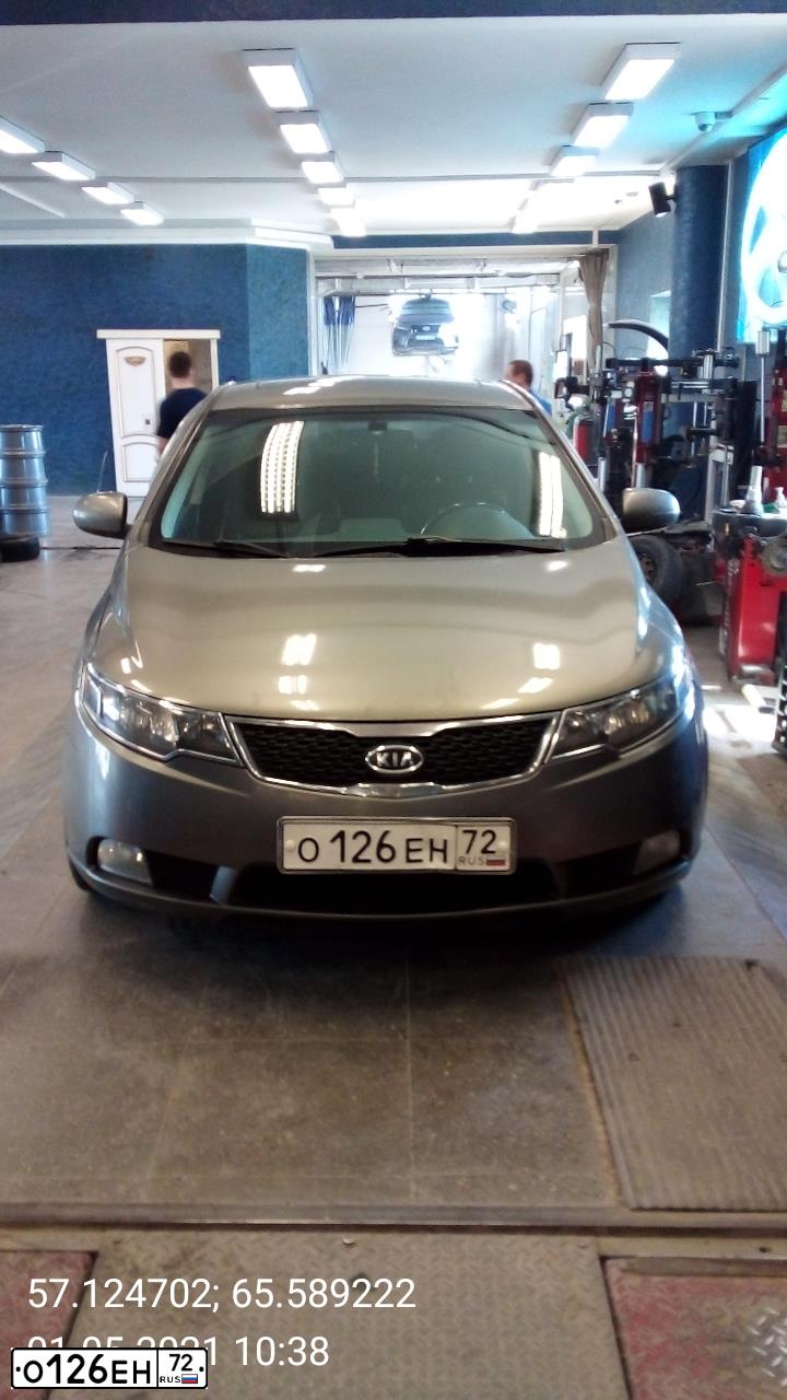 Фото автомобиля KIA CERATO, 2011 — госномер О126ЕН72. Цвет: СЕРЫЙ