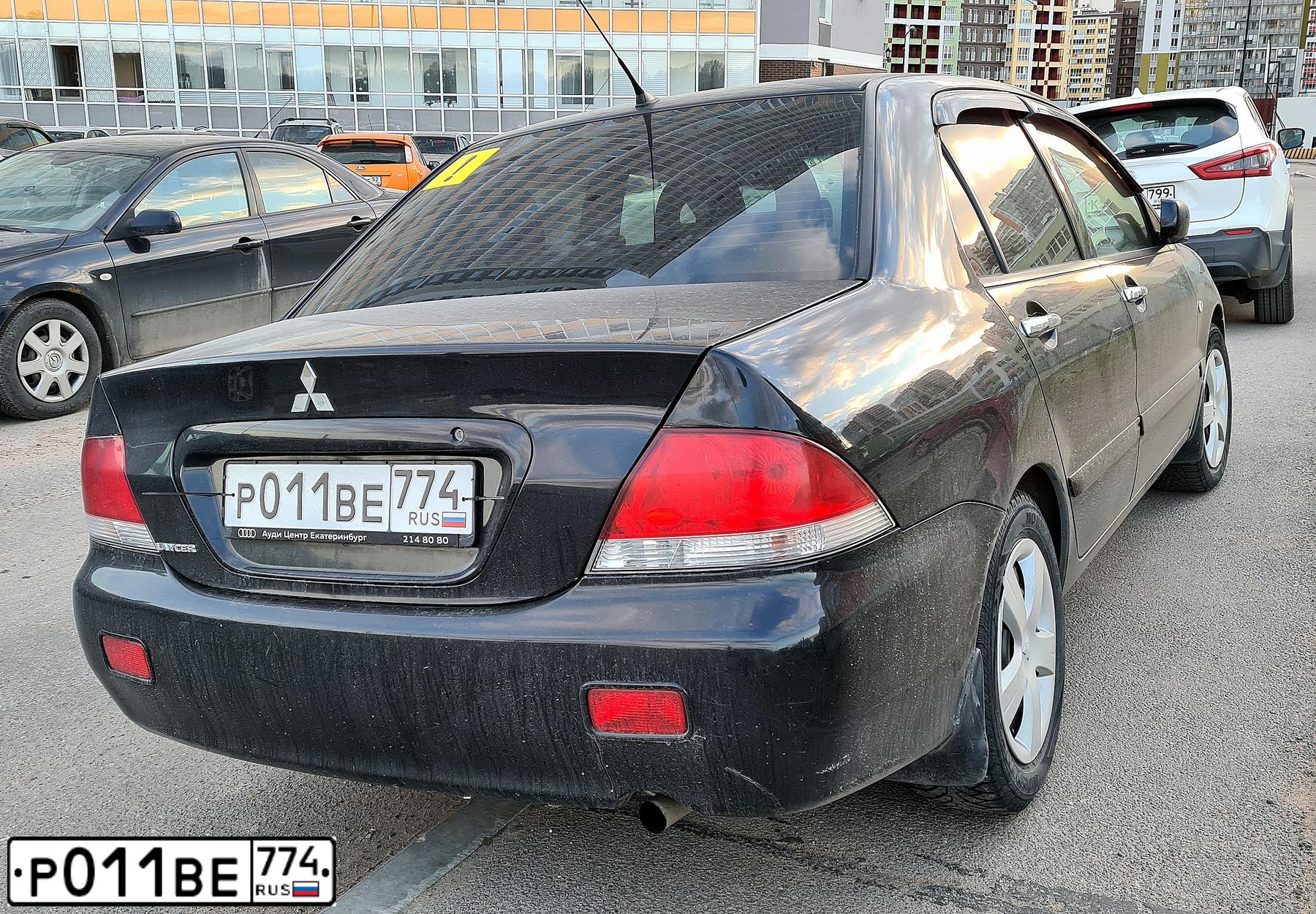 Фото автомобиля MITSUBISHI LANCER, 2007 — госномер А185УК147. Цвет: ЧЕРНЫЙ