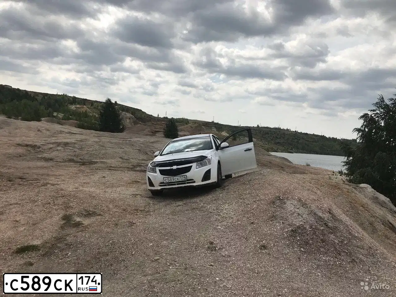 Фото автомобиля CHEVROLET CRUZE, 2013 — госномер М429НТ702. Цвет: Белый