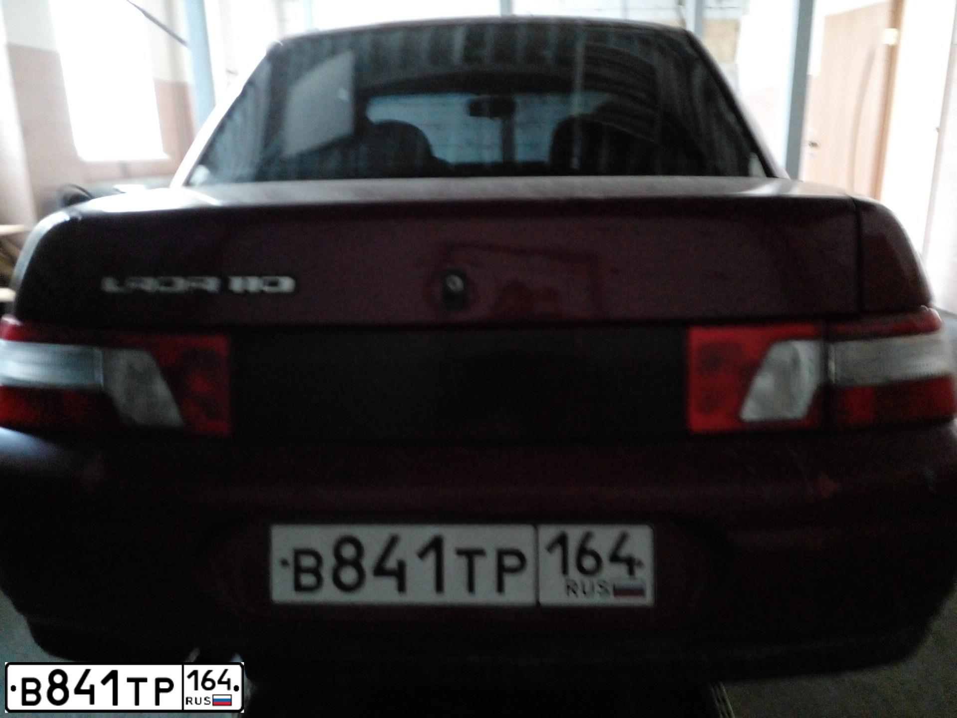 Фото автомобиля LADA 2110, 2001 — госномер К656ХВ164. Цвет: СЕРЕБРИСТО-ЯРКО-КРАСНЫЙ