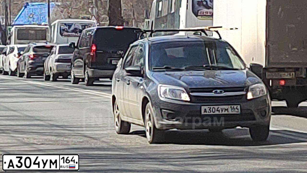 Фото автомобиля LADA 2190 GRANTA, 2018 — госномер А304УМ164. Цвет: СЕРЕБРИСТО-ТЕМНО СЕРЫЙ