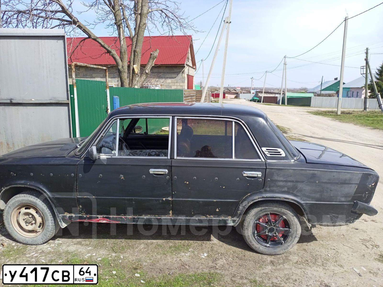 Фото автомобиля LADA 2106, 1991 — госномер У417СВ64. Цвет: ЧЕРНЫЙ