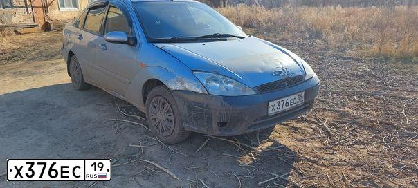 Фото автомобиля FORD FOCUS, 2003 — госномер Н549ЕС138. Цвет: голубой