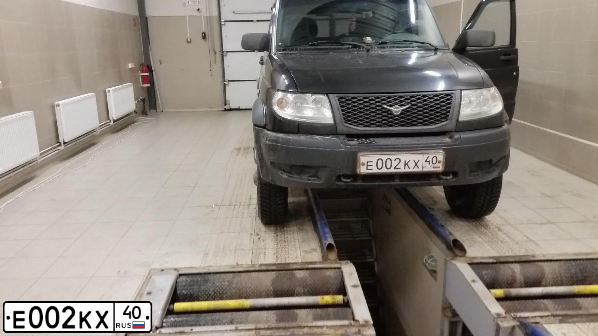 Фото автомобиля RENAULT MEGANE, 2003 — госномер Е002КХ40. Цвет: Светло-Серо-Голубой