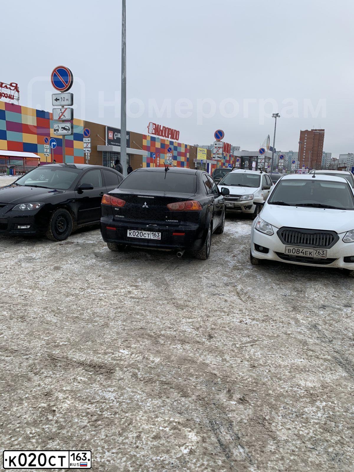 Фото автомобиля MITSUBISHI LANCER, 2008 — госномер К020СТ163. Цвет: ЧЕРНЫЙ