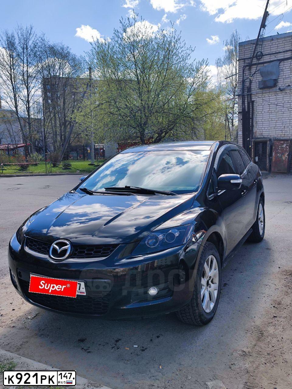 Фото автомобиля MAZDA CX-7, 2007 — госномер К035ОА53. Цвет: ЧЕРНЫЙ