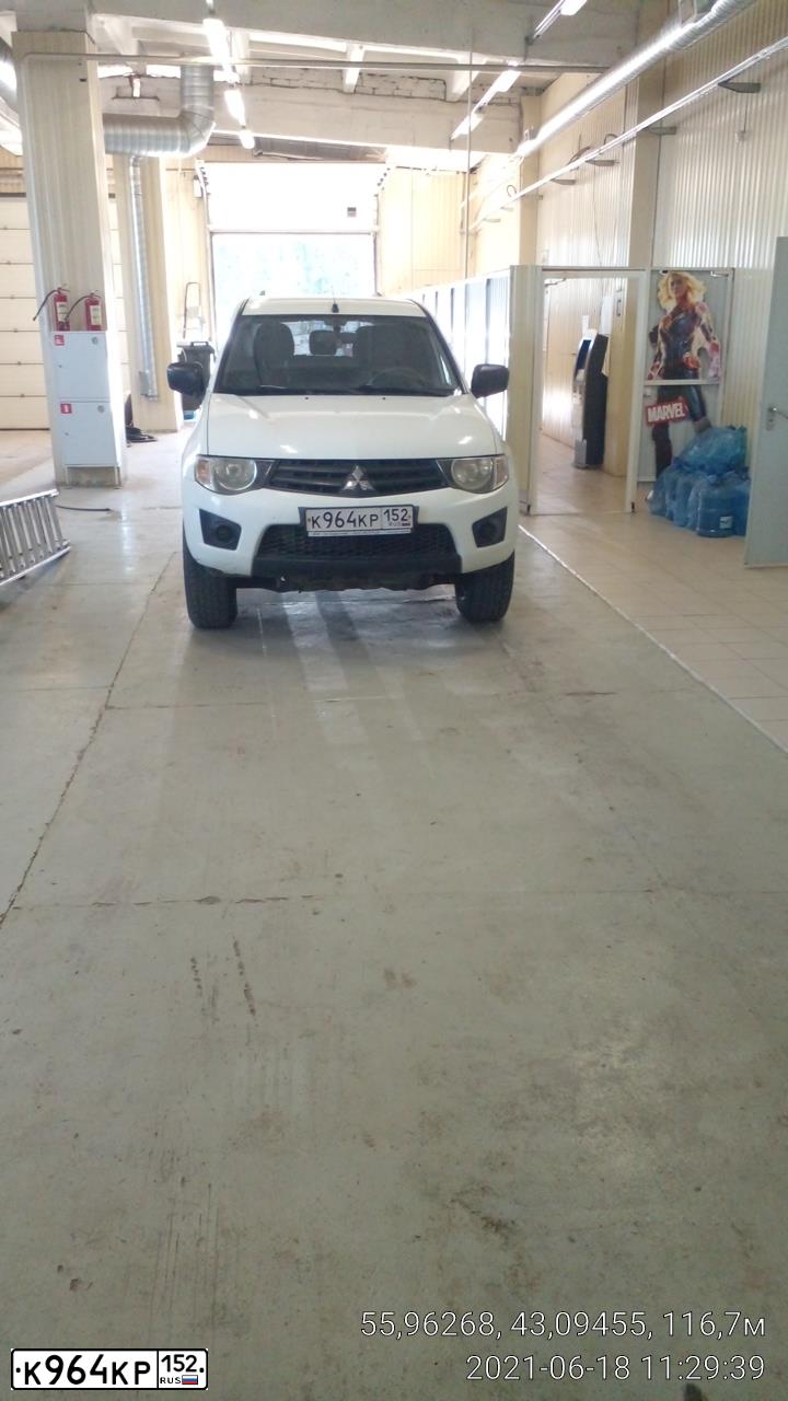 Фото автомобиля MITSUBISHI L 200, 2011 — госномер К964КР152. Цвет: БЕЛЫЙ