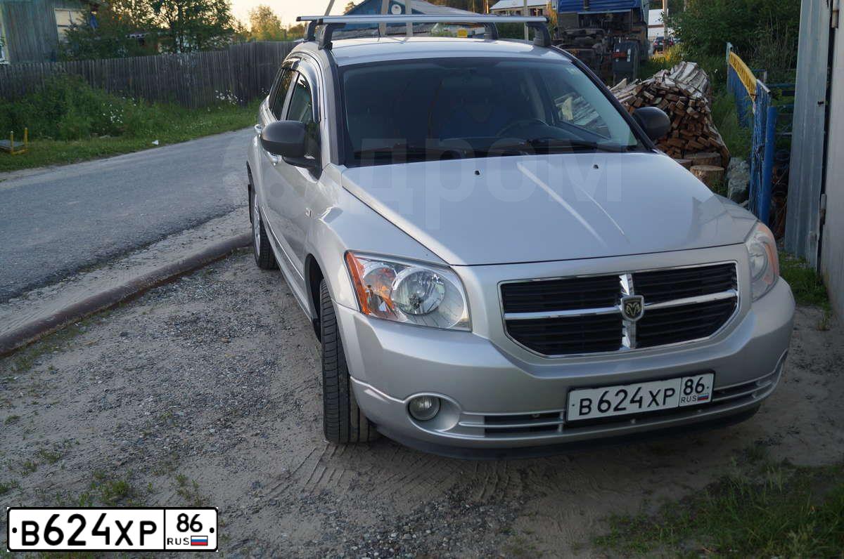 Фото автомобиля DODGE CALIBER, 2007 — госномер К056ВЕ323. Цвет: БЕЛЫЙ (СЕРЕБРИСТЫЙ)