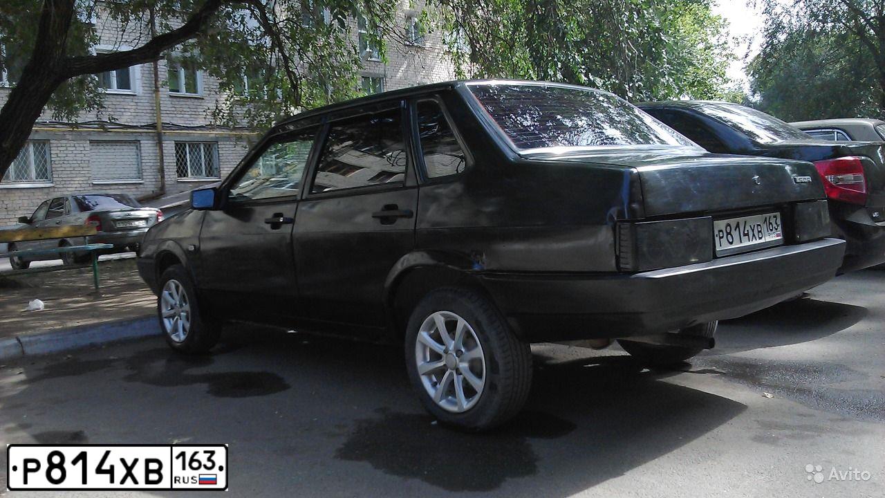 Фото автомобиля LADA 2109 SAMARA, 1994 — госномер А001НЕ63. Цвет: Серебристо-черно-синий