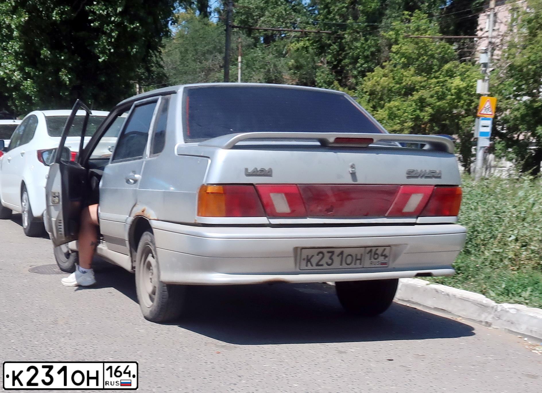 Фото автомобиля LADA 2115 SAMARA, 2002 — госномер К231ОН164. Цвет: СВЕТЛО-СЕРЕБРИСТЫЙ МЕТАЛЛ