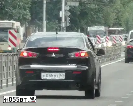 Фото автомобиля MITSUBISHI LANCER, 2013 — госномер Н055ВТ48. Цвет: ЧЕРНЫЙ