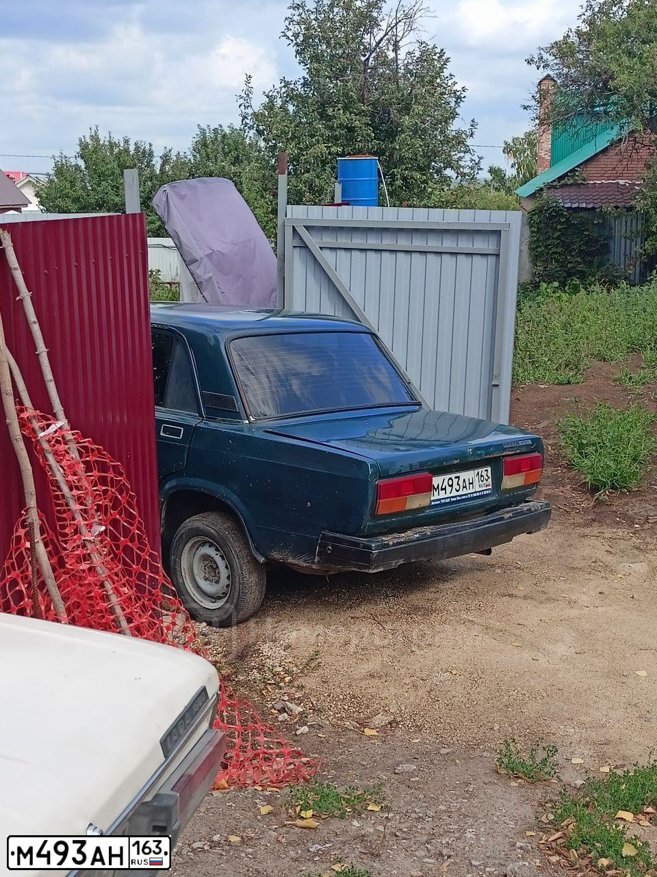 Фото автомобиля LADA 2107, 2005 — госномер Е071ОН51. Цвет: Темно-зеленый