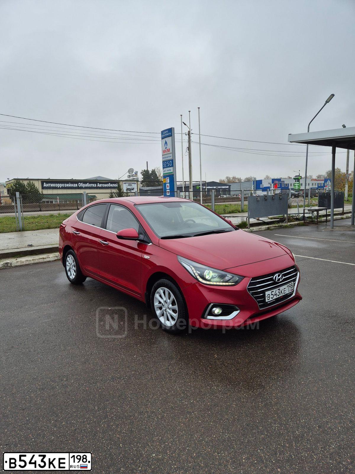 Фото автомобиля HYUNDAI SOLARIS, 2018 — госномер О301ТТ69. Цвет: Красный