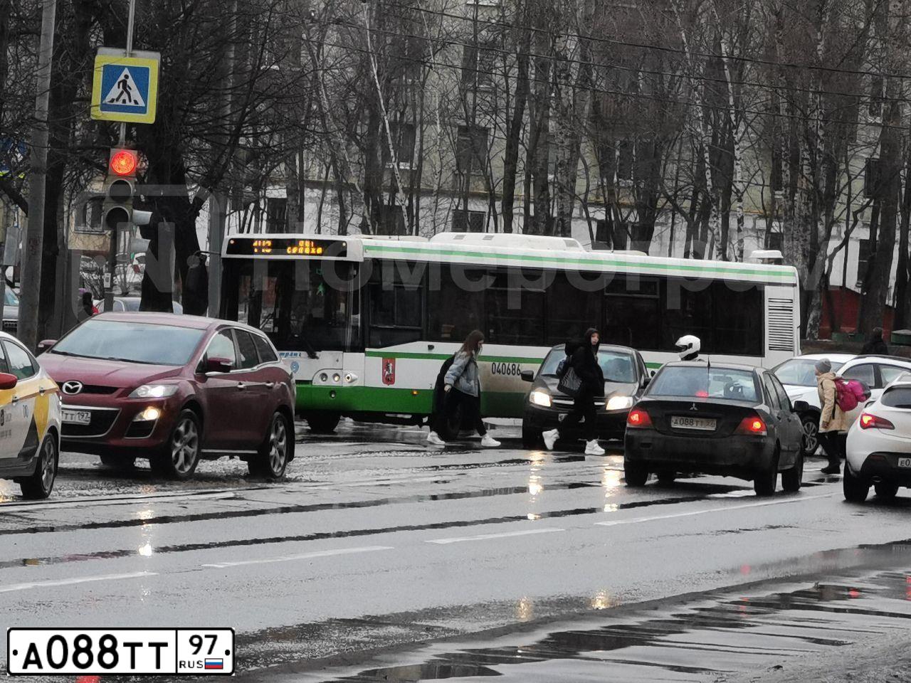 Фото автомобиля MITSUBISHI LANCER, 2004 — госномер А965ВА184. Цвет: ЧЕРНЫЙ