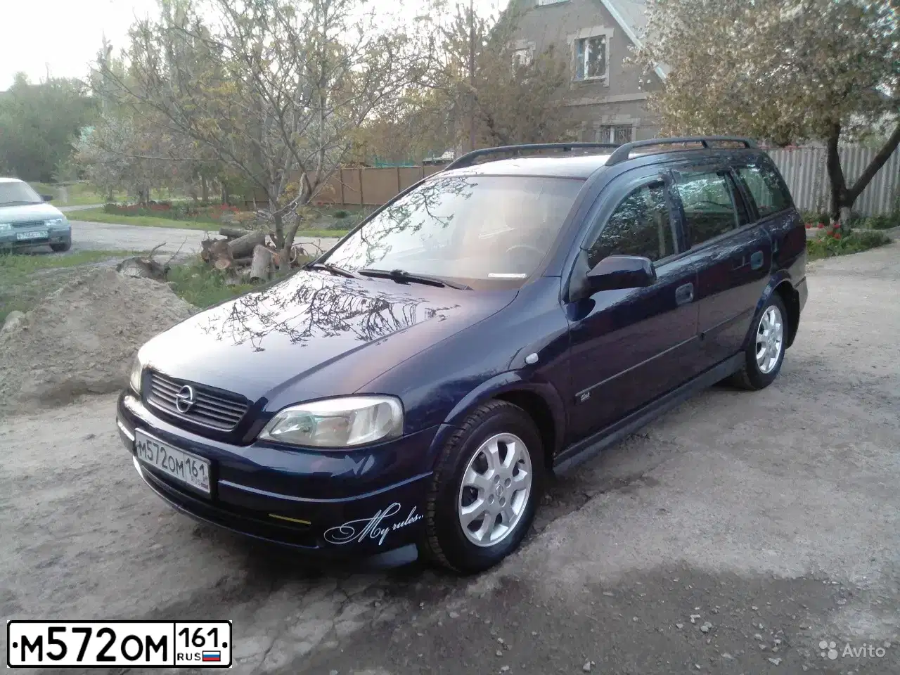 Фото автомобиля OPEL ASTRA, 1999 — госномер М572ОМ161. Цвет: ТЕМНО-СИНИЙ
