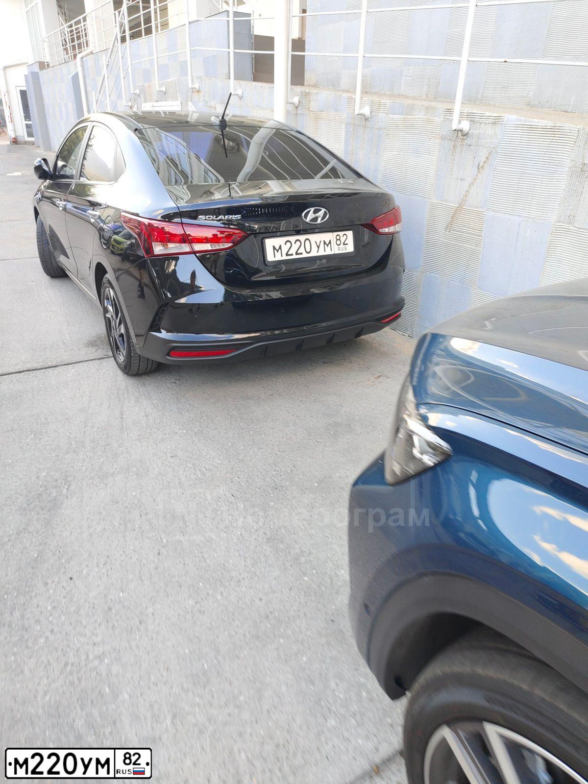 Фото автомобиля HYUNDAI SOLARIS, 2022 — госномер М220УМ82. Цвет: ЧЕРНЫЙ