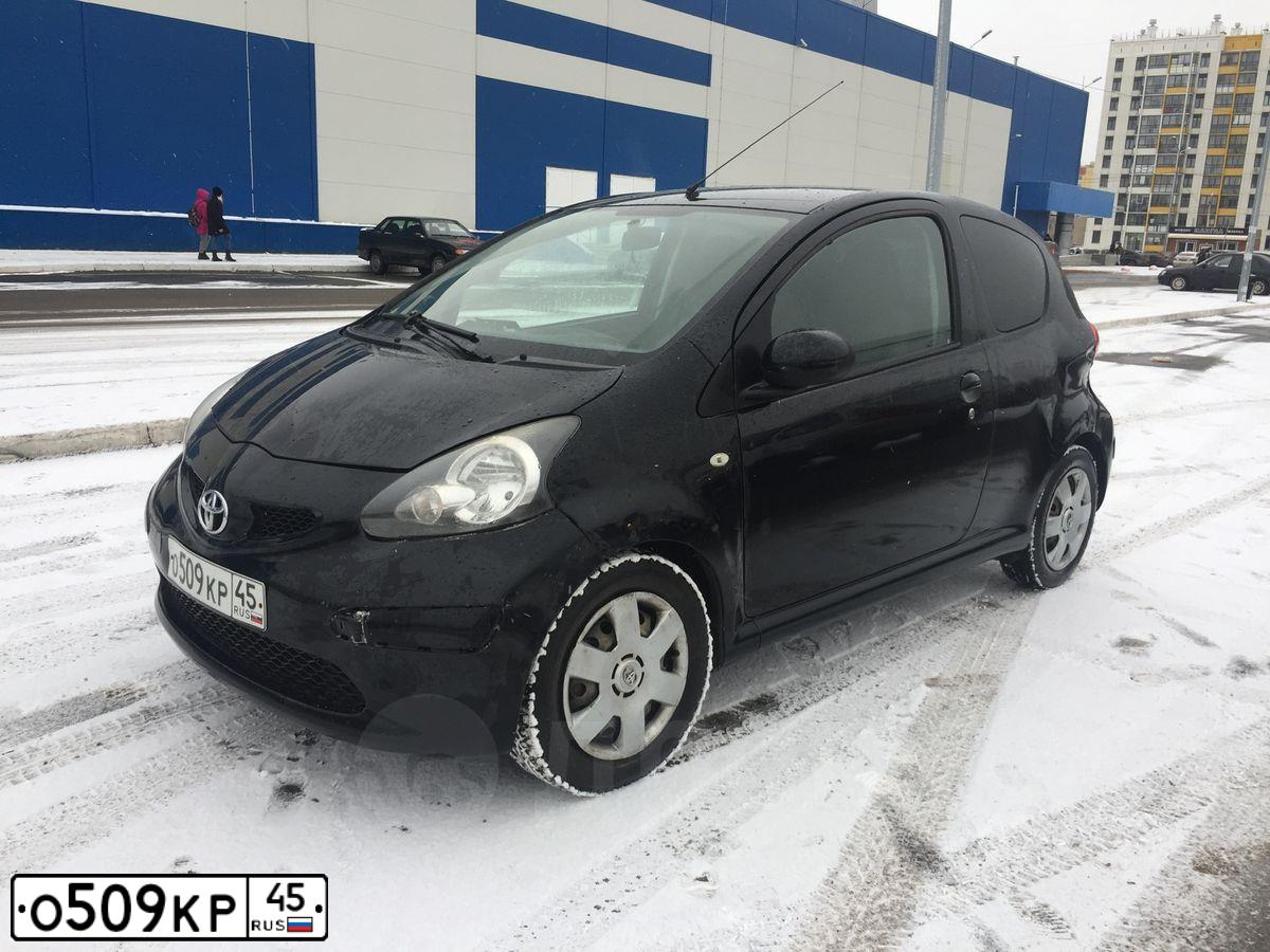 Фото автомобиля TOYOTA AYGO, 2009 — госномер О678АЕ774. Цвет: ЧЕРНЫЙ