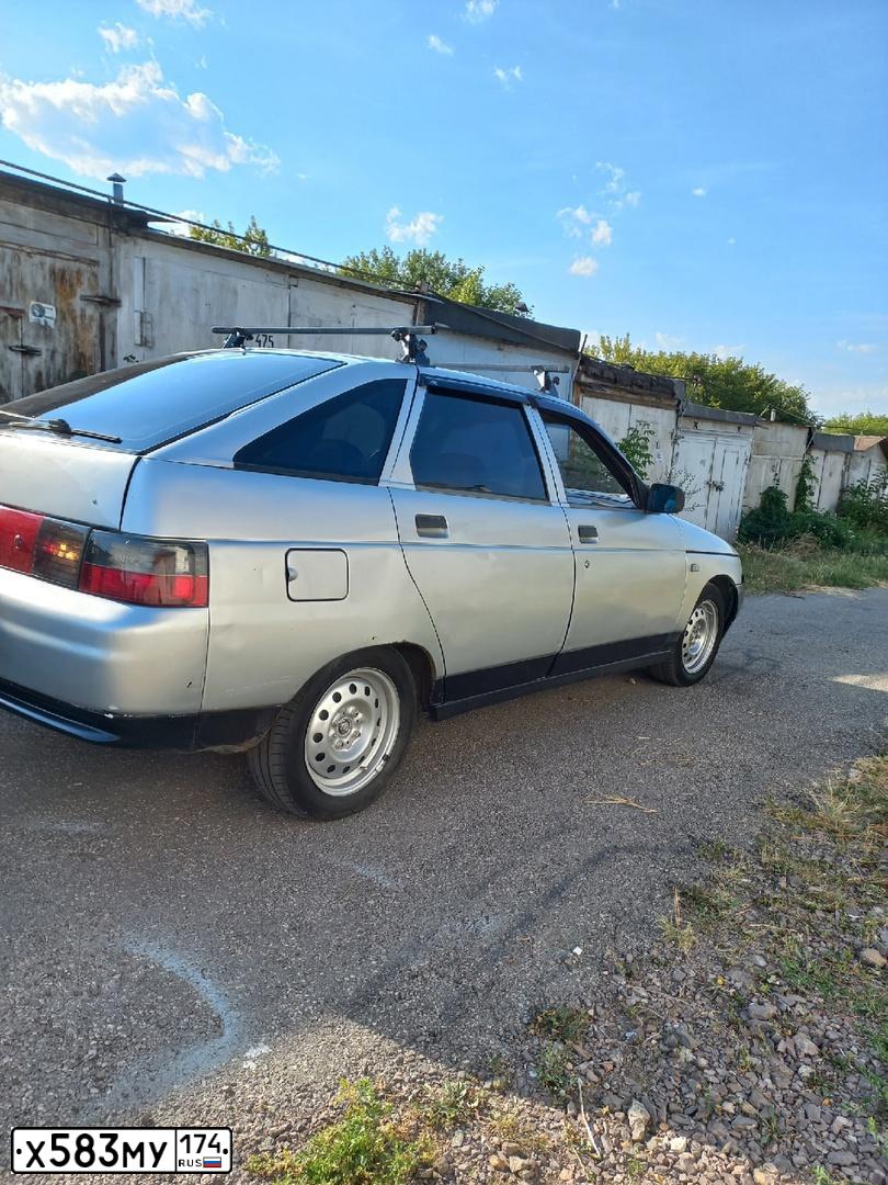 Фото автомобиля LADA 2112, 2001 — госномер М539ВХ774. Цвет: СВЕТЛО-СЕРЕБРИСТЫЙ МЕТАЛЛ