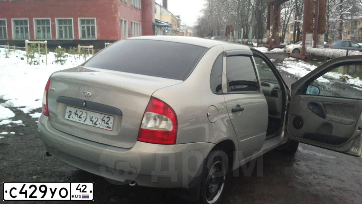 Фото автомобиля LADA 2112, 2007 — госномер Х701МТ142. Цвет: БЕЖЕВО-СИРЕНЕВЫЙ