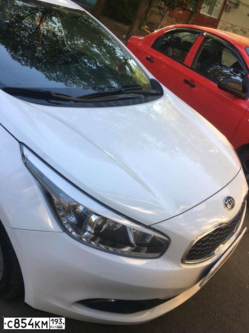 Фото автомобиля KIA CEE'D, 2013 — госномер С854КМ193. Цвет: Белый