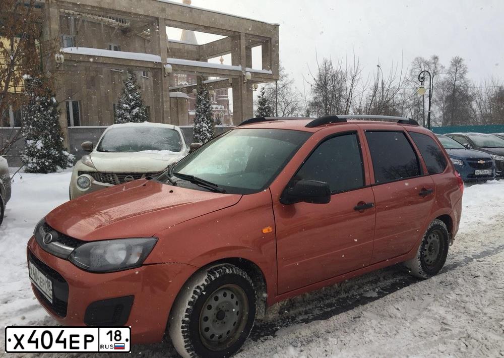 Фото автомобиля LADA 2194 KALINA, 2014 — госномер Х404ЕР18. Цвет: ОРАНЖЕВЫЙ