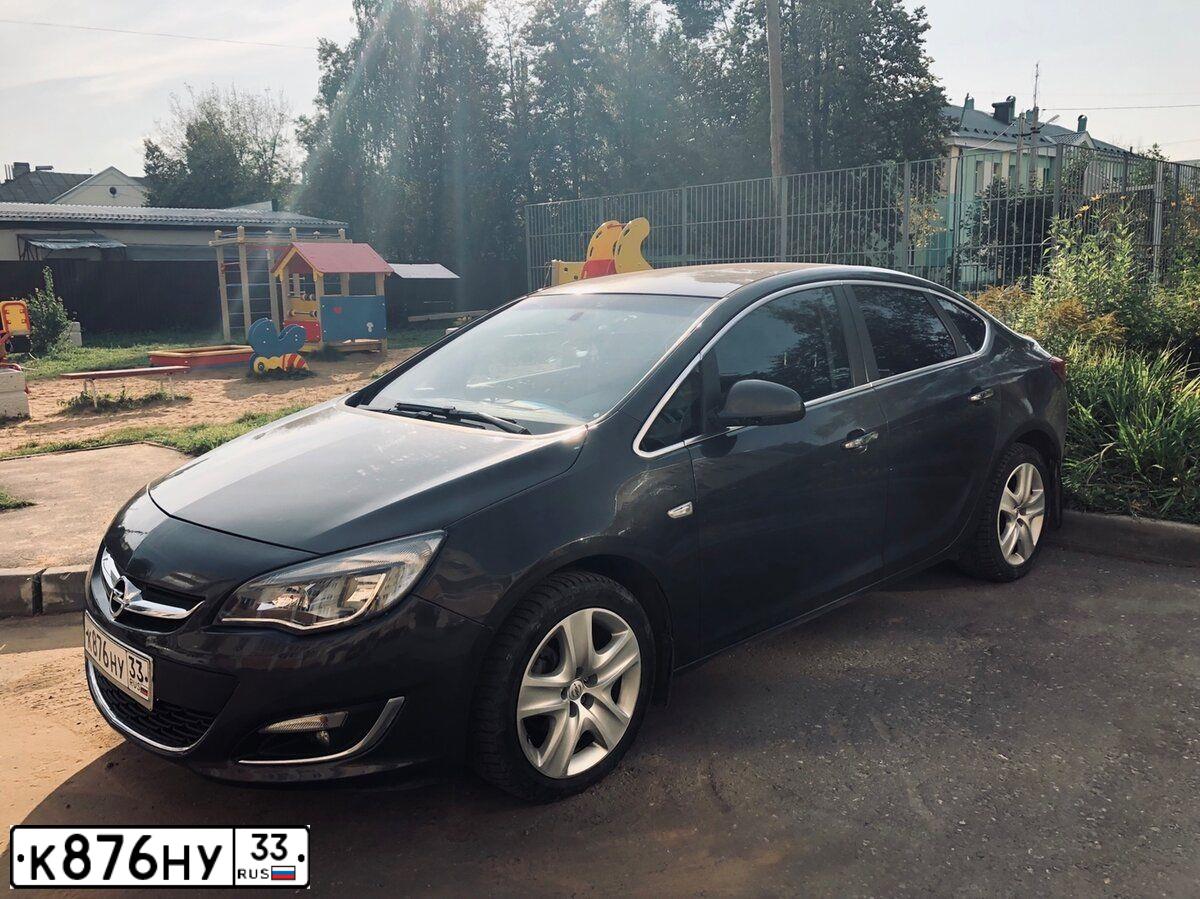 Фото автомобиля OPEL ASTRA, 2013 — госномер К876НУ33. Цвет: СЕРЫЙ МЕТАЛЛИК