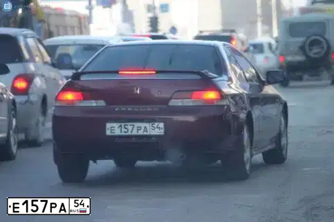Фото автомобиля HONDA CR-V, 2003 — госномер Е157РА154. Цвет: ТЕМНО-СИНИЙ