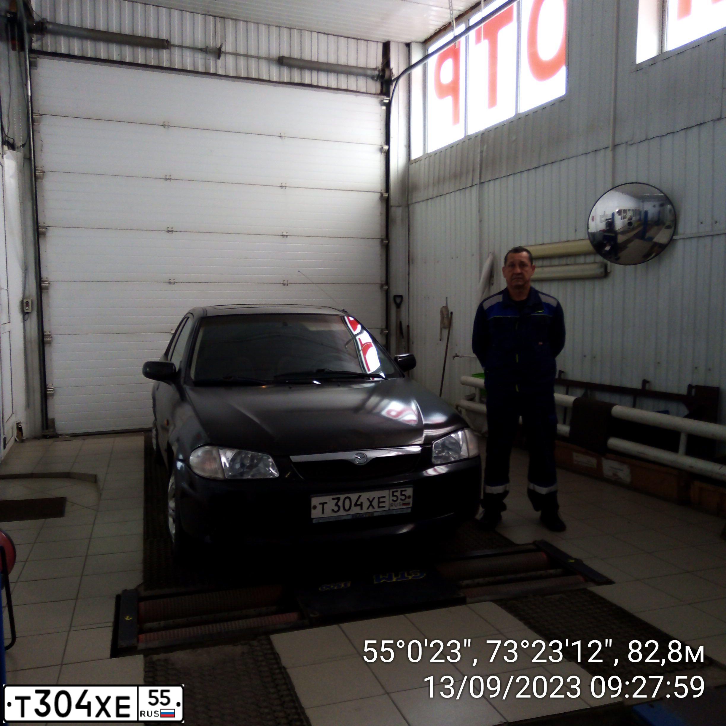 Фото автомобиля MAZDA 323, 1998 — госномер Т304ХЕ55