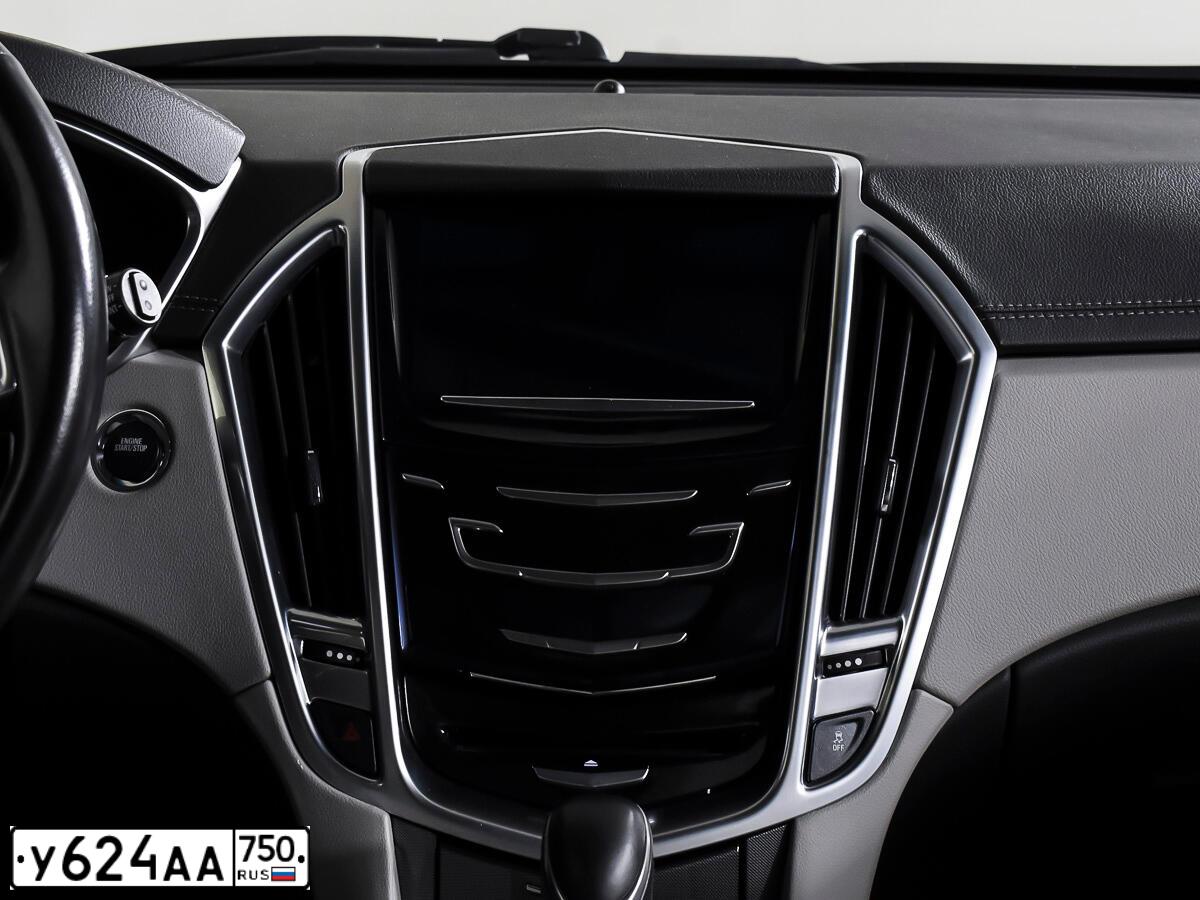 Фото автомобиля CADILLAC SRX, 2014 — госномер М982РЕ13. Цвет: КОРИЧНЕВЫЙ МЕТАЛЛИК