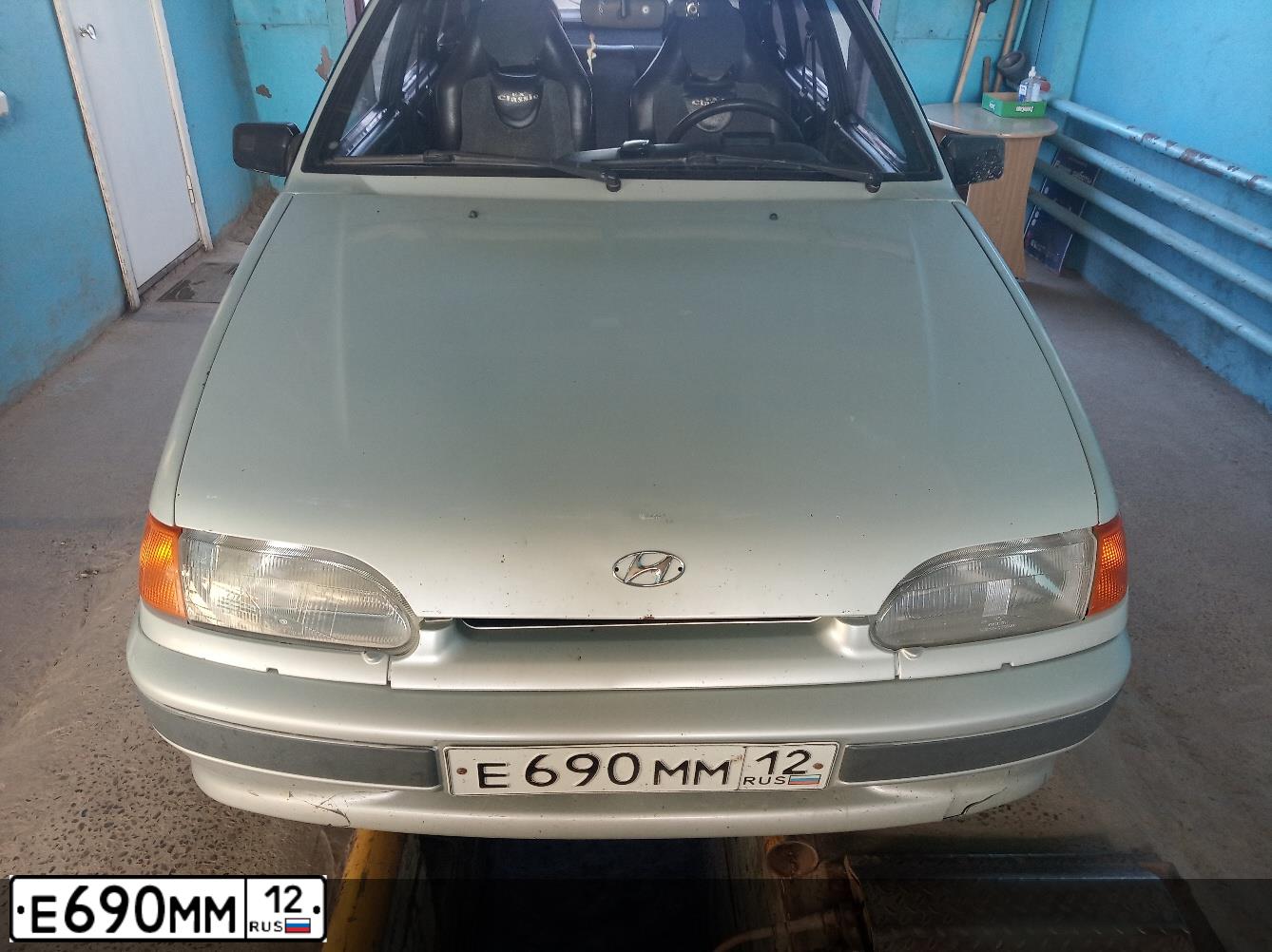 Фото автомобиля LADA 2114 SAMARA, 2005 — госномер Е690ММ12. Цвет: МОЛОЧНО-БЕЛ.СЕРЕБР.