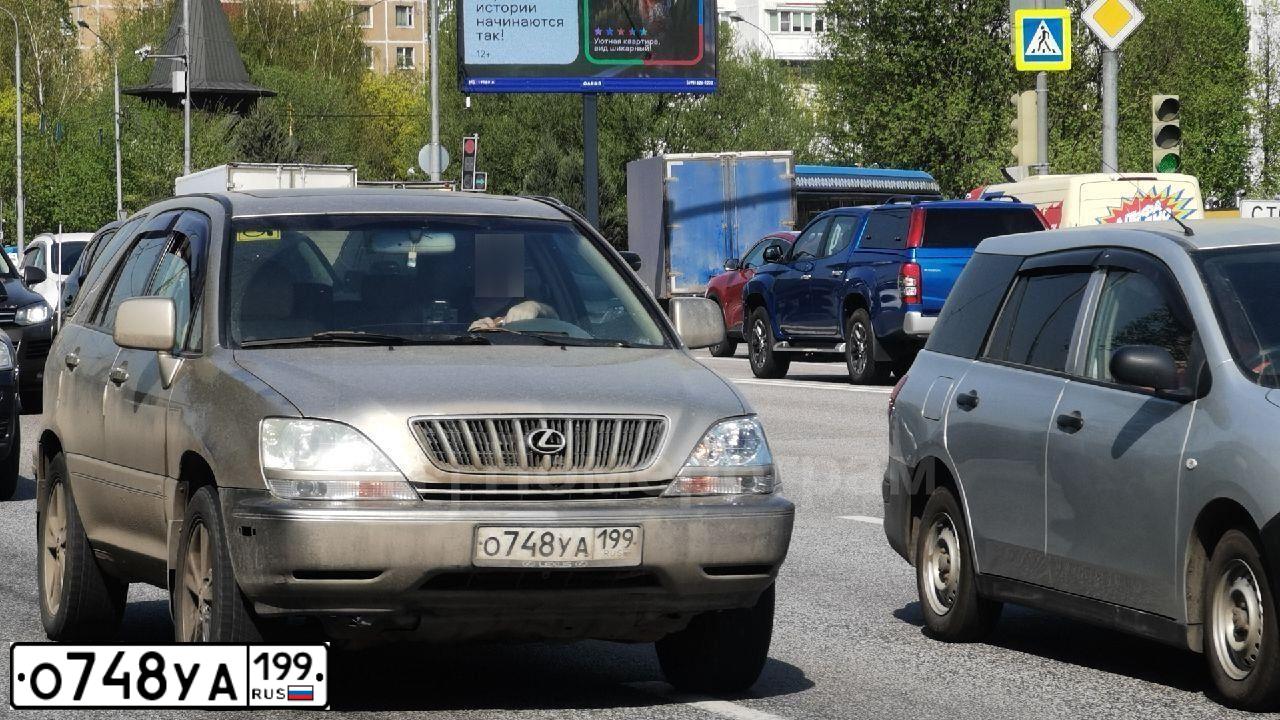 Фото автомобиля LEXUS RX, 2001 — госномер О748УА199. Цвет: БЕЖЕВЫЙ