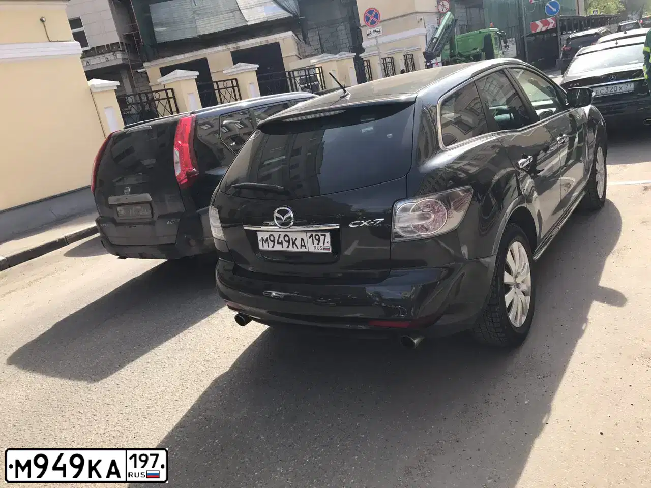 Фото автомобиля MAZDA CX-7, 2010 — госномер М949КА197. Цвет: ЧЕРНЫЙ