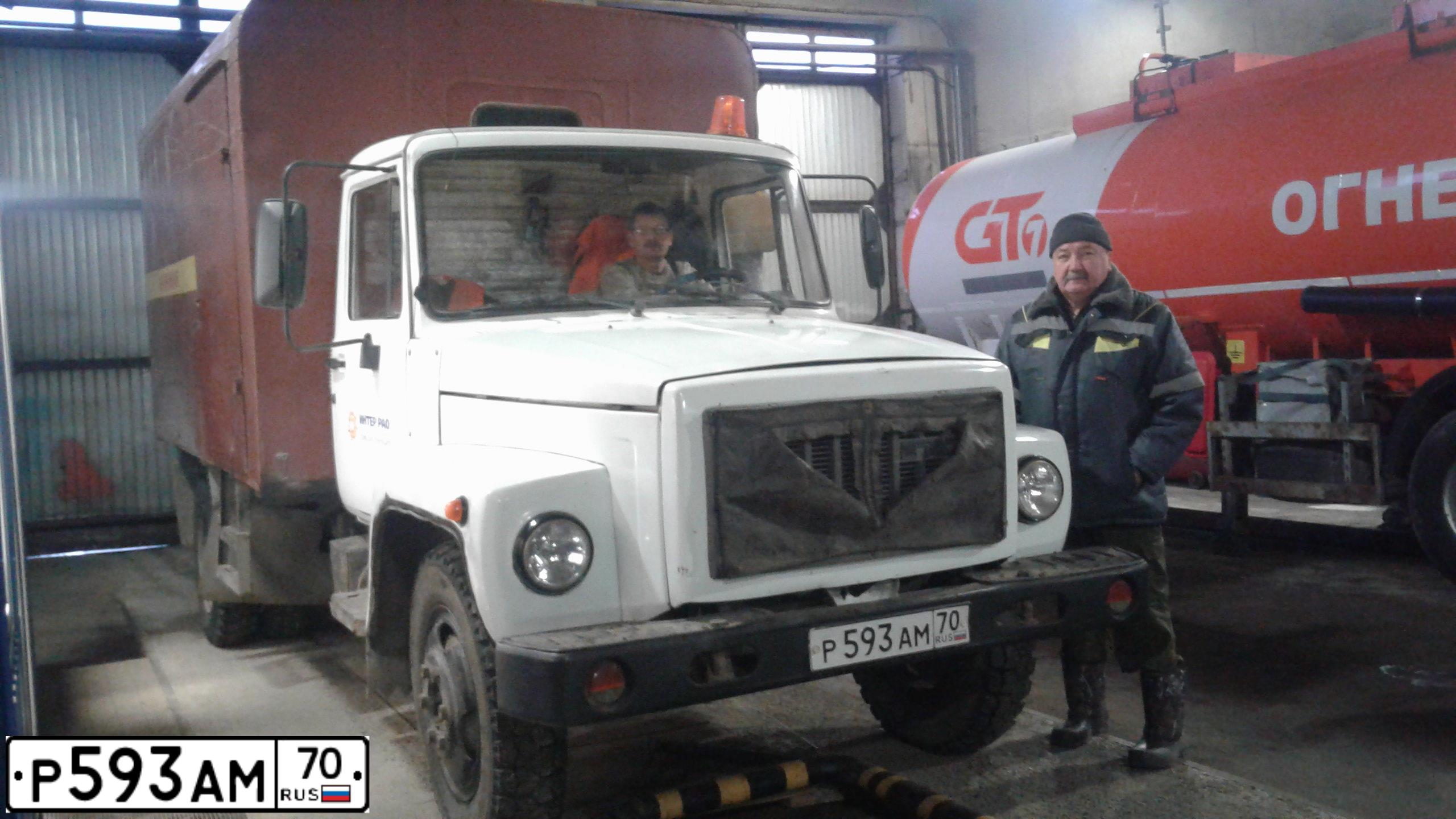 Фото автомобиля GAZ 3307, 2002 — госномер Р593АМ70. Цвет: БЕЛЫЙ
