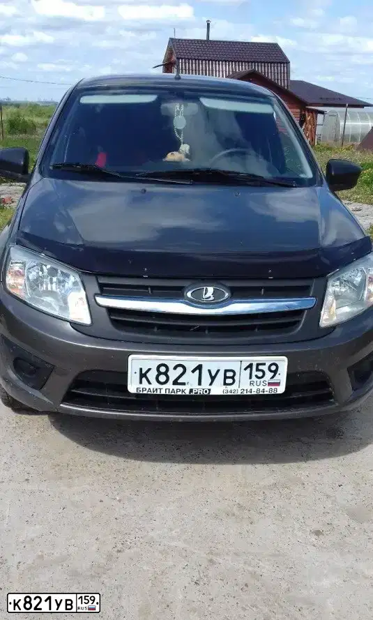 Фото автомобиля LADA 2190 GRANTA, 2015 — госномер О799КТ159. Цвет: Золотисто-коричневый