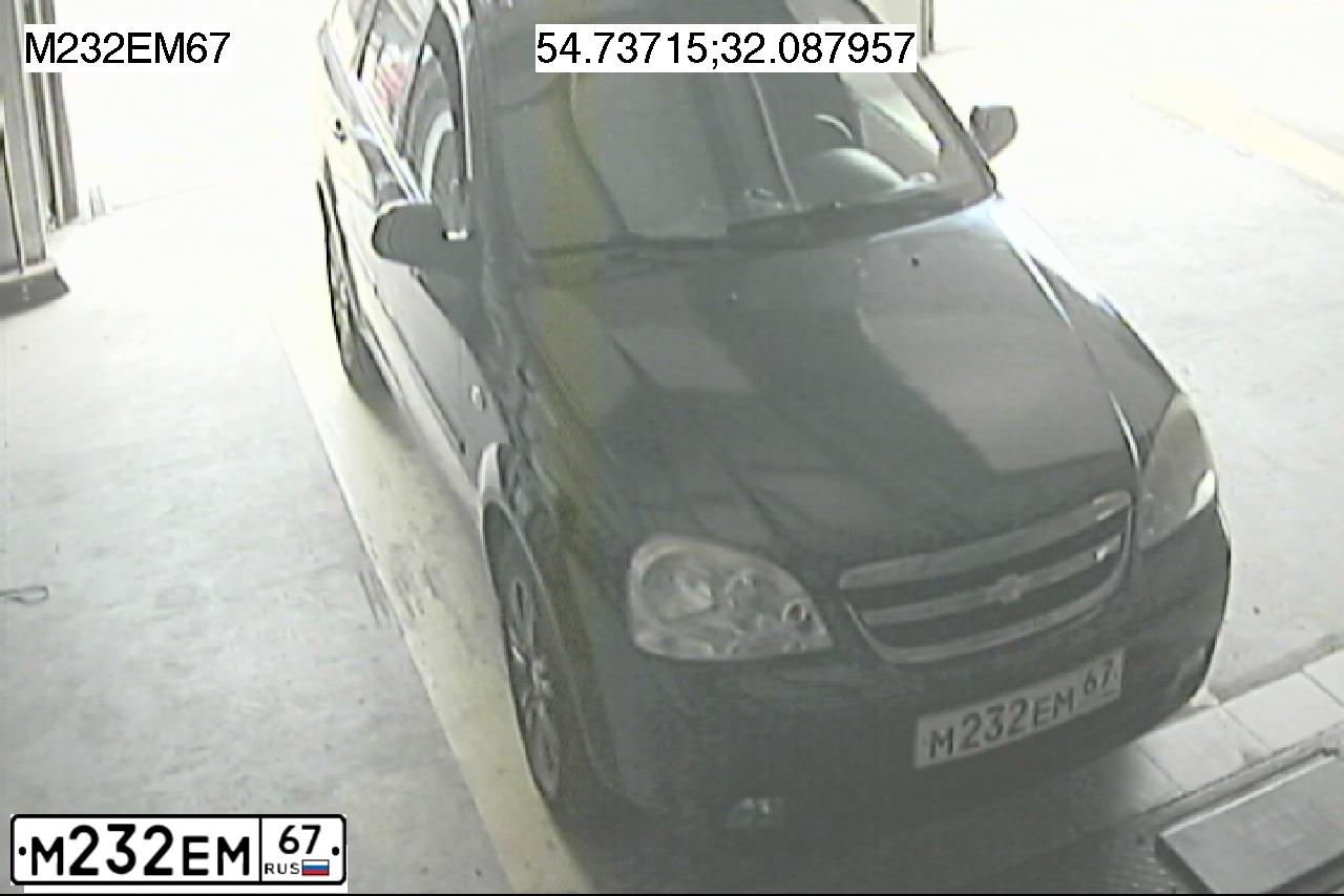Фото автомобиля CHEVROLET LACETTI, 2008 — госномер М232ЕМ67. Цвет: ЧЕРНЫЙ
