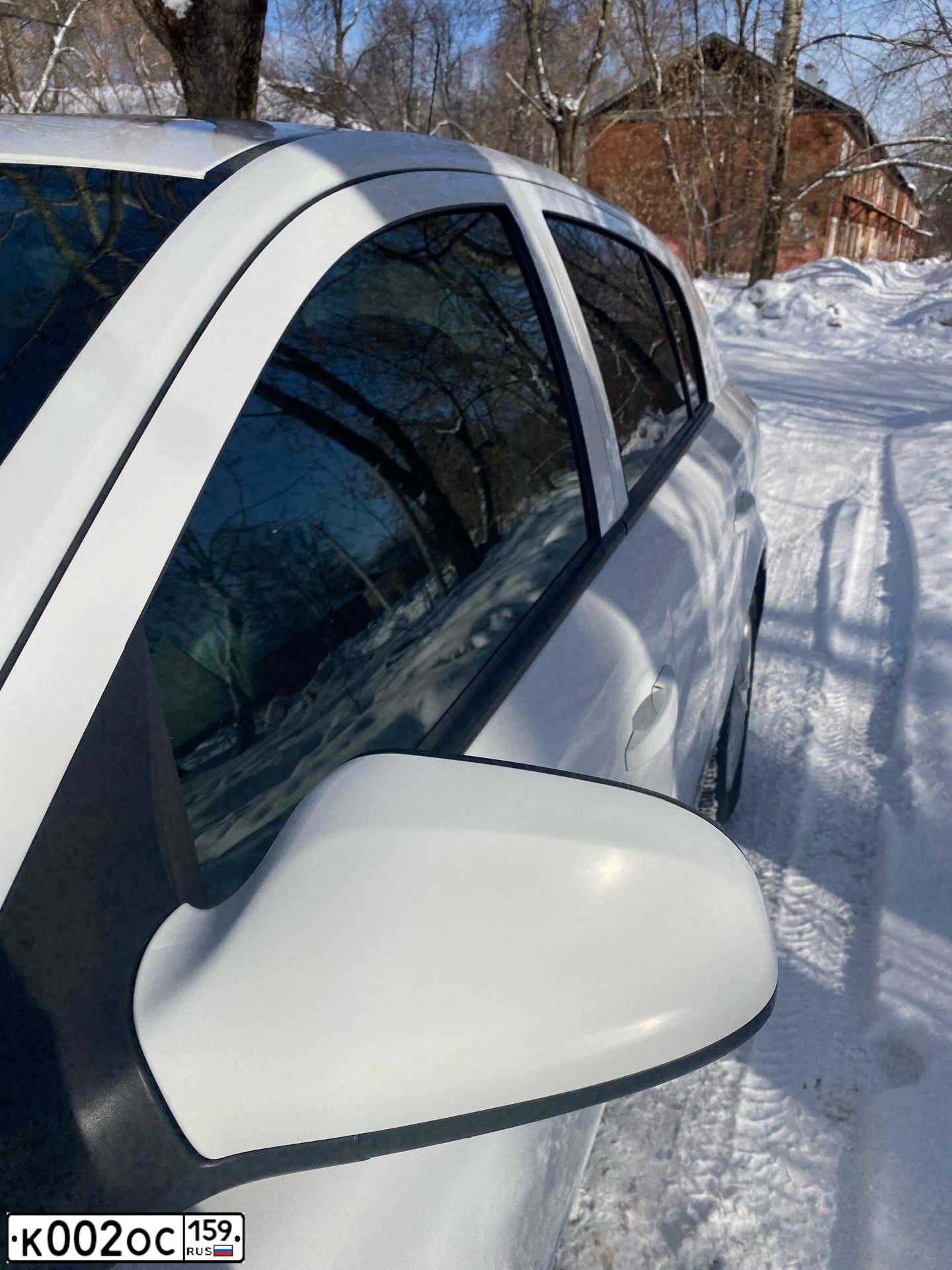 Фото автомобиля OPEL ASTRA, 2012 — госномер К002ОС159. Цвет: Белый