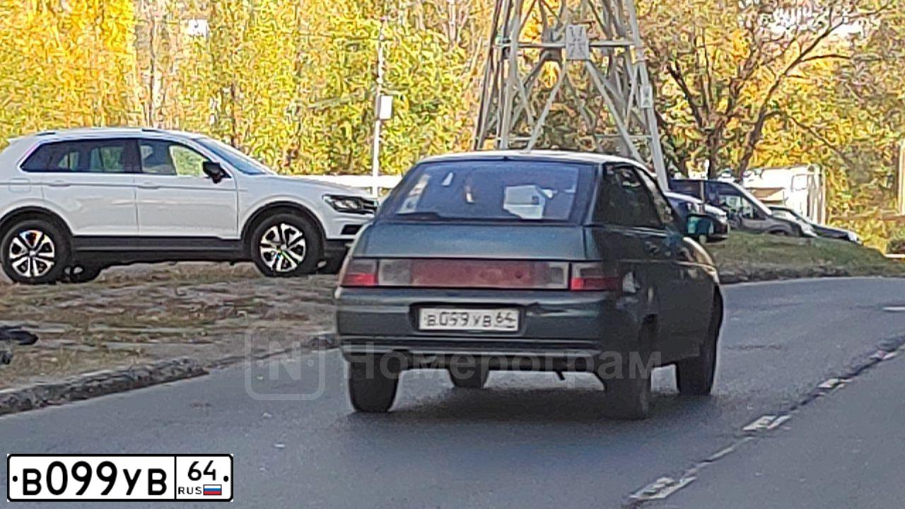 Фото автомобиля LADA 2112, 2007 — госномер М385КН164. Цвет: СЕРО-СИНЕ ЗЕЛЕНЫЙ