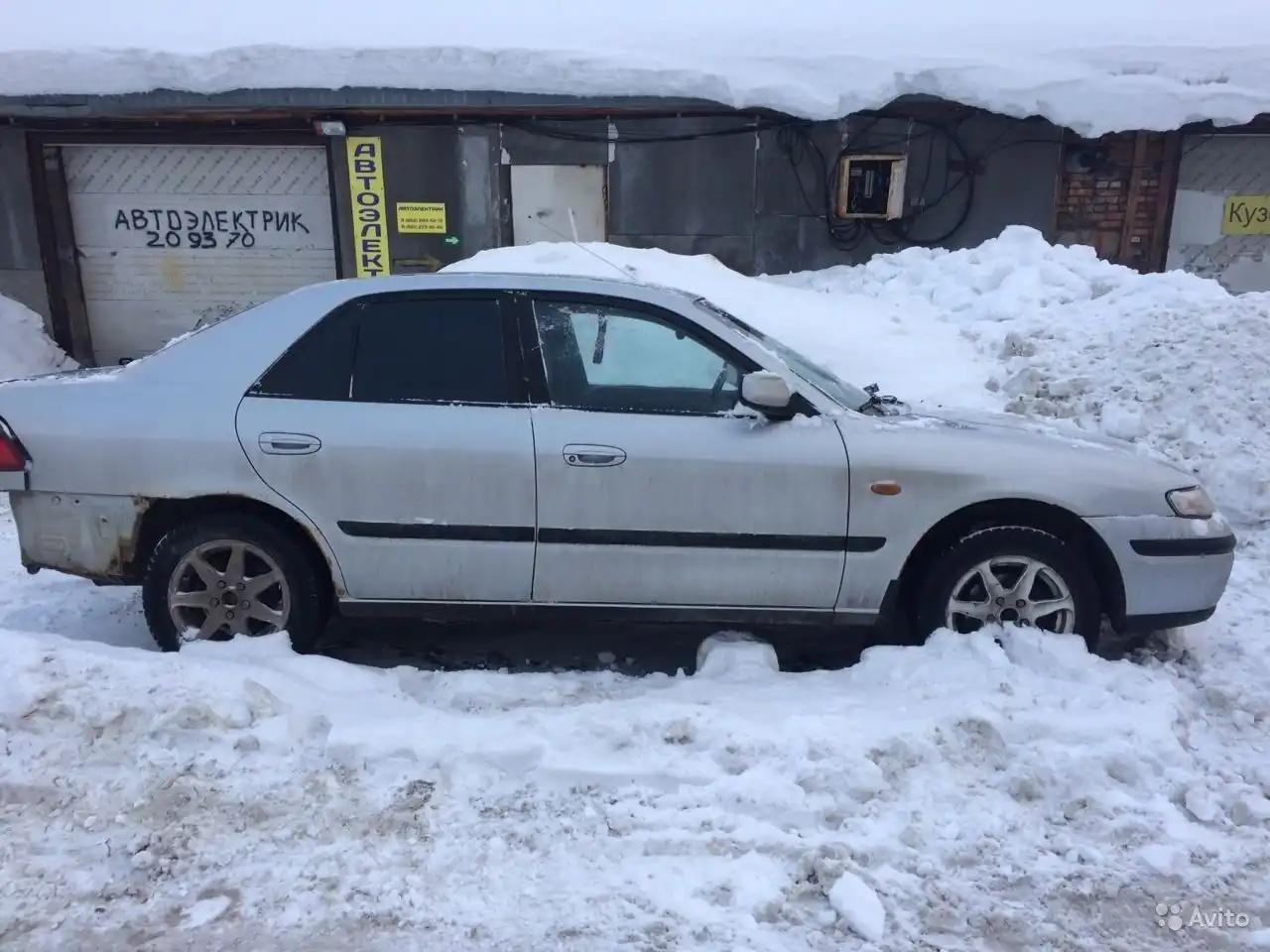 Фото автомобиля MAZDA 626, 1999 — госномер Н272ТТ35. Цвет: серебристый