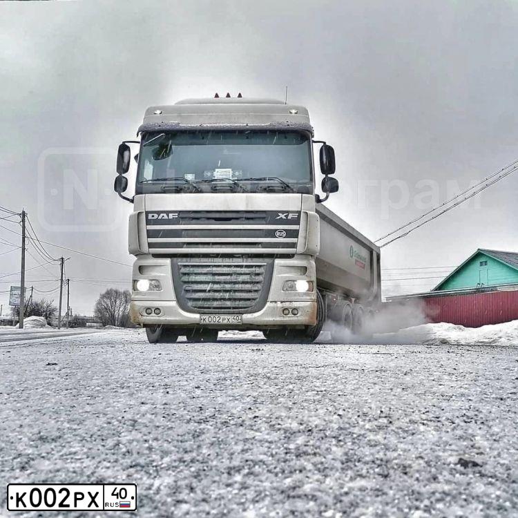 Фото автомобиля FORD FOCUS, 2005 — госномер К002РХ40. Цвет: ЧЕРНЫЙ