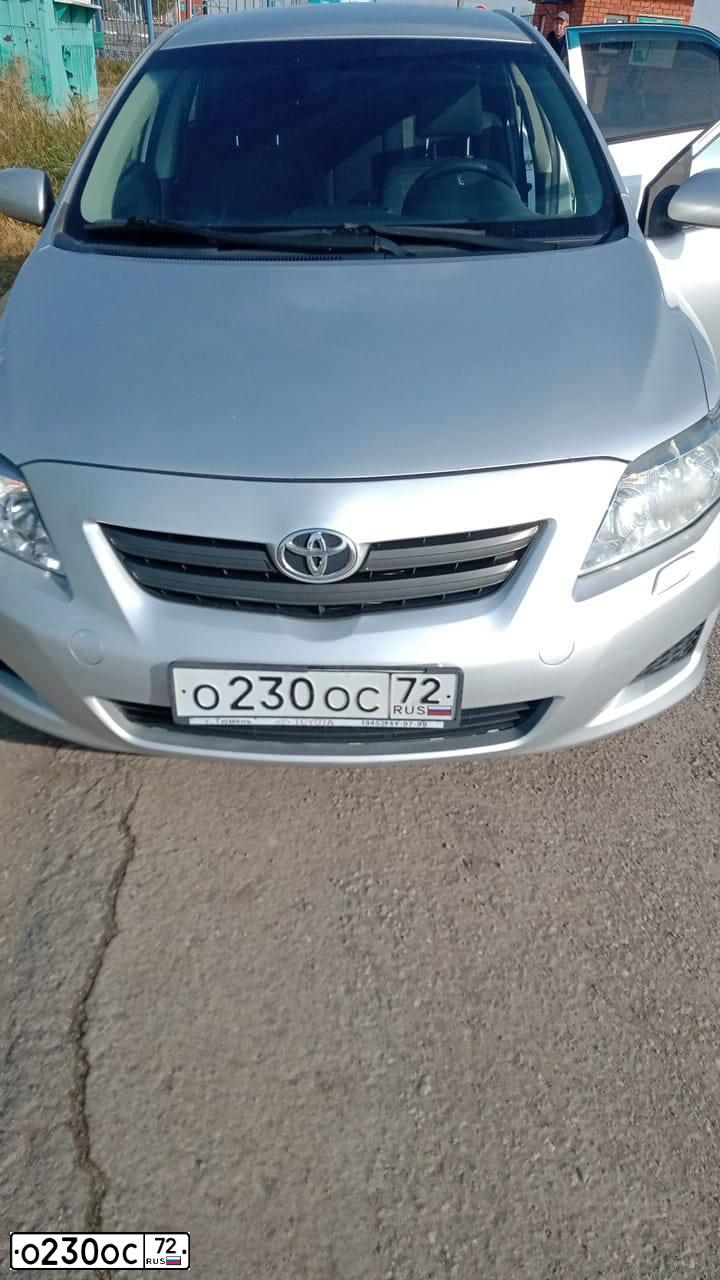 Фото автомобиля TOYOTA COROLLA, 2007 — госномер С924НЕ45. Цвет: Серебристый