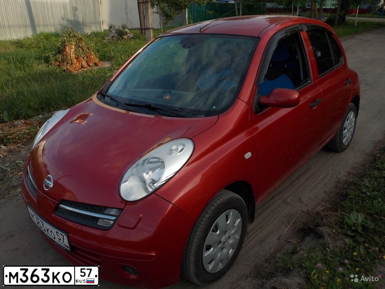 Фото автомобиля NISSAN MICRA, 2005 — госномер Н372ТР32. Цвет: Красный
