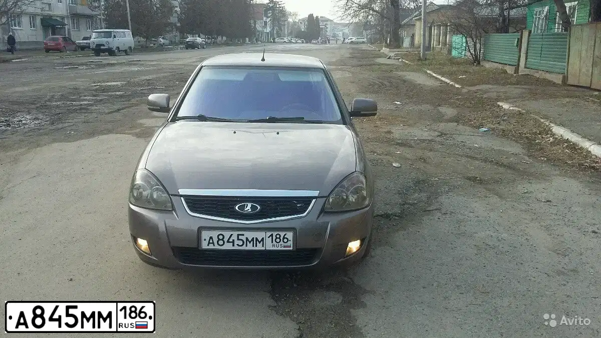 Фото автомобиля LADA 2170 PRIORA, 2015 — госномер В123АВ09. Цвет: Золотисто-коричневый