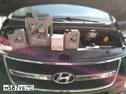 Фото автомобиля HYUNDAI H 1/H 100/STAREX, 2012 — госномер М587УЕ197. Цвет: ЧЕРНЫЙ
