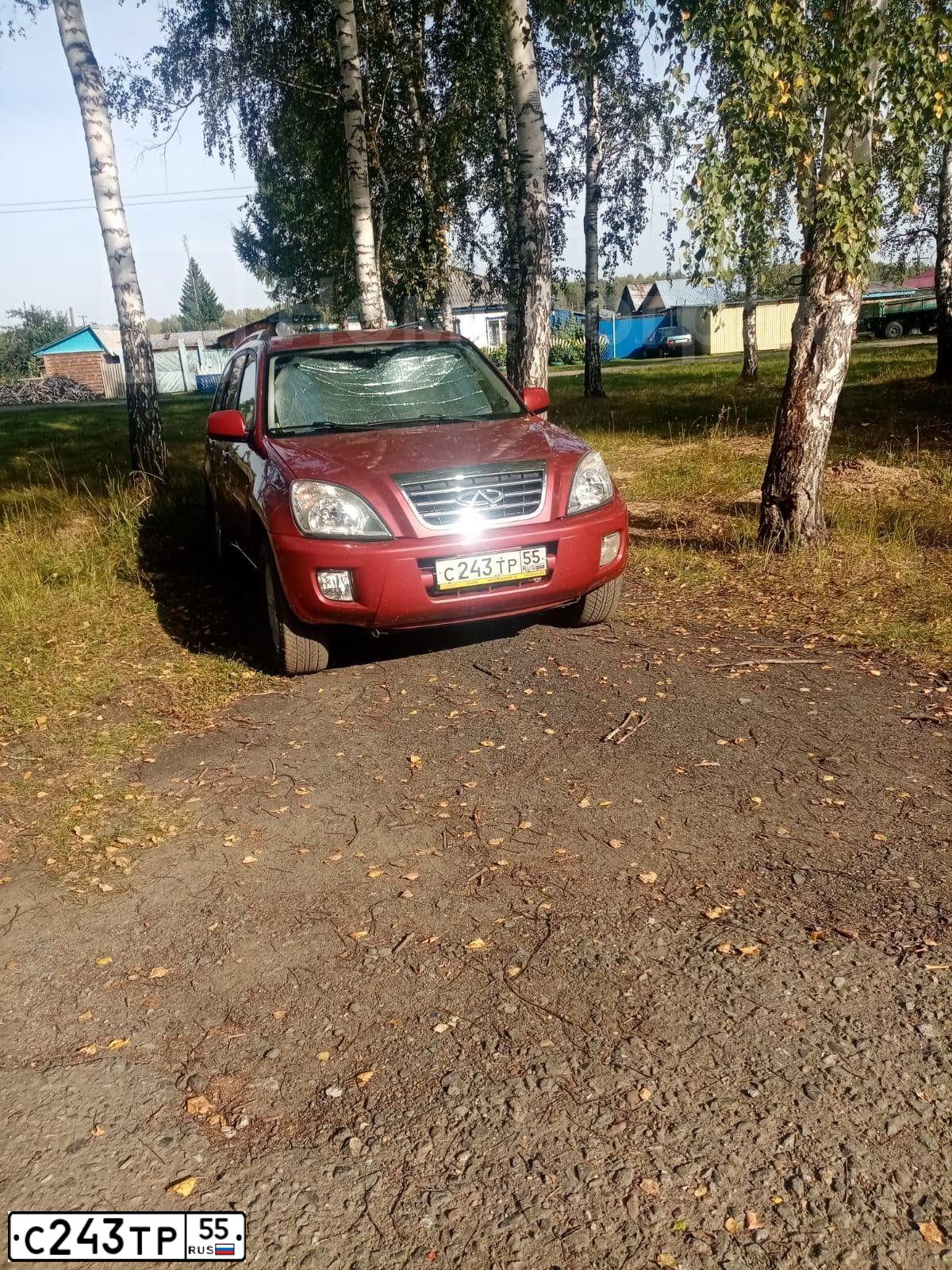 Фото автомобиля CHERY TIGGO, 2013 — госномер С243ТР55. Цвет: Красный